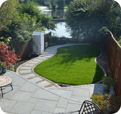 limestone patio and lawn back garden 