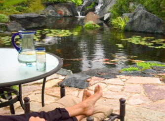 relaxing next to a swim pond